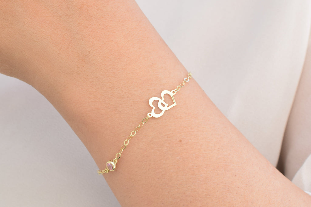 Dames gouden armband, dames armband, hartjes met steentje armband, dames armband met roze steentje en hartjes, dubbele hart armband, gouden dubbele hart met steen armband, prachtige dames armband